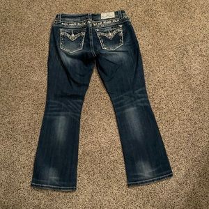 EUC Women’s Miss Me mid-rise boot cut jeans 30.